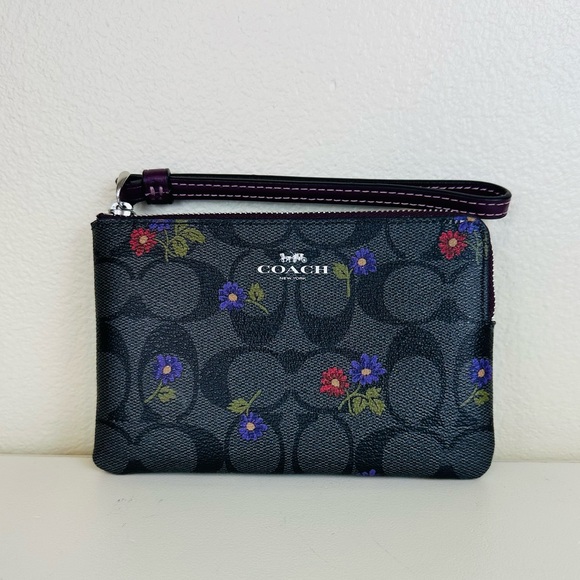 Coach Handbags - COACH Corner Zip Wristlet With Floral Signature Print